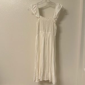 Smocked white maternity dress